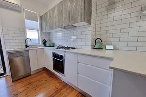 Kitchen at Adamstown Short Stay Apartments.