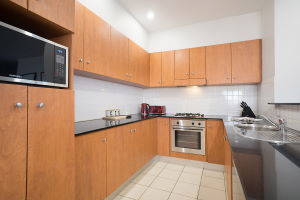 The Kitchen of the Three Bedroom Apartment at Boulevard Apartments.