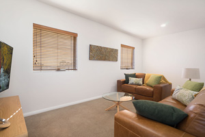 The Living Room of the Three Bedroom Apartment at Boulevard Apartments.