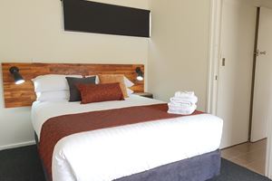 Queen Bed within the Quad Unit at Black Sheep Motel.