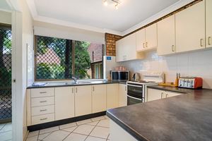 The Kitchen of Centennial Terrace Apartments Superior 2 Bedroom Unit.