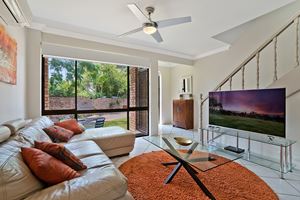 The Living Room of Centennial Terrace Apartments Superior 2 Bedroom Unit.