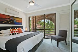 The Main Bedroom of Centennial Terrace Apartments Superior 2 Bedroom Unit.