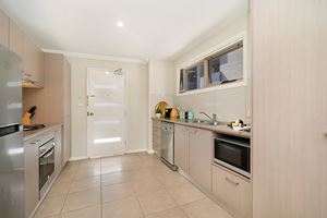 The Kitchen of a 2 Bedroom Townhouse Apartment at Birmingham Gardens Townhouses.