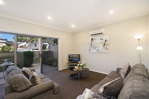 The Living Room of a 2 Bedroom Townhouse Apartment at Birmingham Gardens Townhouses.