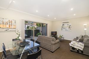 The Living Room of a 2 Bedroom Townhouse Apartment at Birmingham Gardens Townhouses.