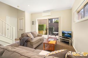 The Living Room of a 2 Bedroom Townhouse Apartment at Birmingham Gardens Townhouses.