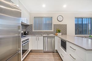 The Kitchen of a 3 Bedroom Townhouse Apartment at Birmingham Gardens Townhouses.