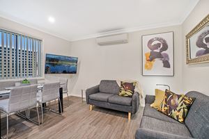 The Living Room of a 3 Bedroom Townhouse Apartment at Birmingham Gardens Townhouses.