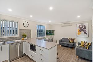 The Living Room of a 3 Bedroom Townhouse Apartment at Birmingham Gardens Townhouses.