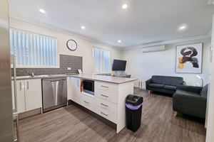 The Living Room of a 3 Bedroom Townhouse Apartment at Birmingham Gardens Townhouses.