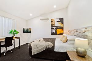 The Master Bedroom of a 3 Bedroom Townhouse Apartment at Birmingham Gardens Townhouses.