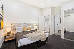 The Master Bedroom of a 3 Bedroom Townhouse Apartment at Birmingham Gardens Townhouses.