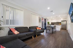 The Living Room of a 5 Bedroom Townhouse Apartment at Birmingham Gardens Townhouses.