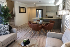 The Living Room of a 3 Bedroom Townhouse Apartment at Adamstown Townhouses.