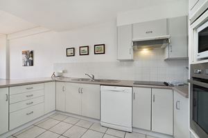 The Kitchen at Sandbar Apartment.