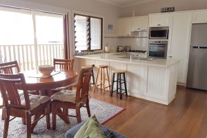 The kitchen and dining room in the Vista Apartment.